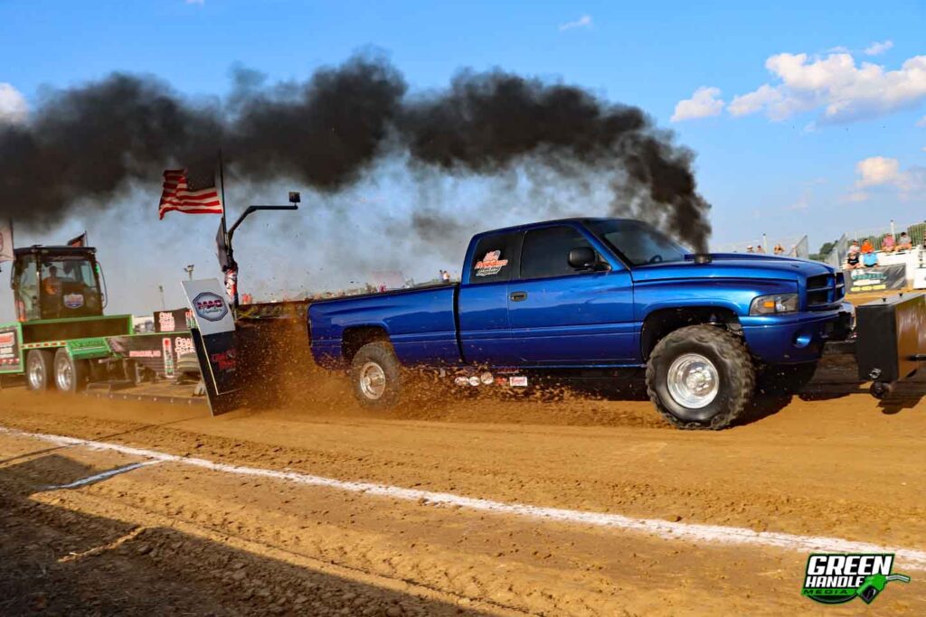 Dodge Ram Cummins Diesel Truck Pulling Sled